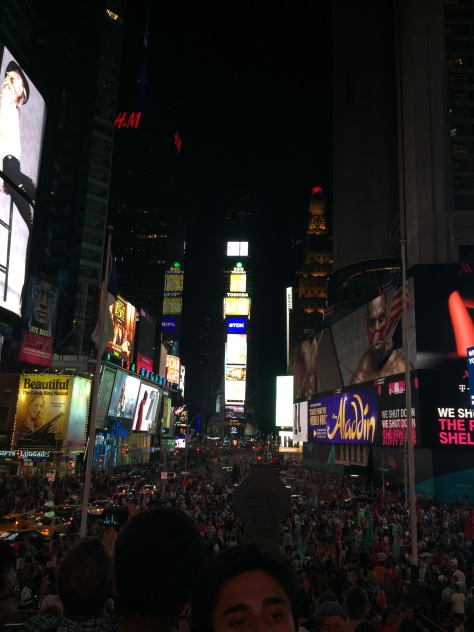 Times Square at night. Lights and life boosted at their maximum.